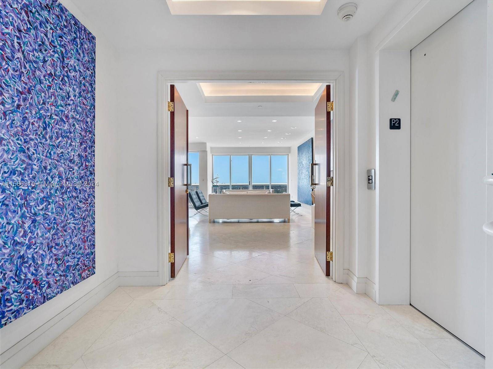 Experience unparalleled luxury at Bal Harbour's Majestic Tower PH206.