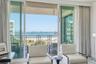 While entertaining friends, enjoy the soothing sound of the water and watch fun boat activity.