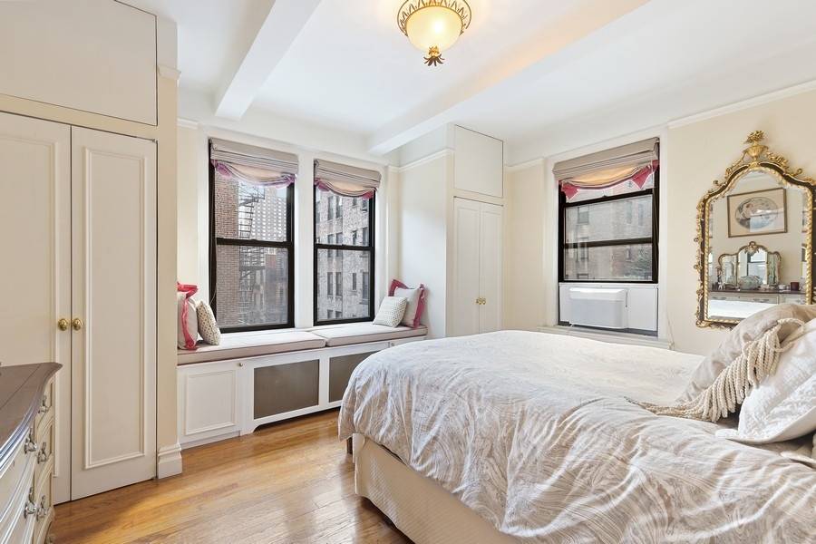 With high beamed ceilings, a decorative fireplace, hardwood floors, and a location on East 91st between Park and Lexington, this light filled one bedroom home personifies the charm of classic ...