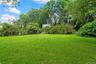 View of yard featuring view of scattered trees