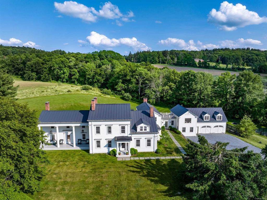 Hidden Fox is an architecturally significant and quintessentially Millbrook home on 28 acres giving access to miles of riding and hiking trails.