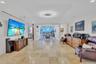 Bright and Cheerful - TV/Den Area - Travertine Floors