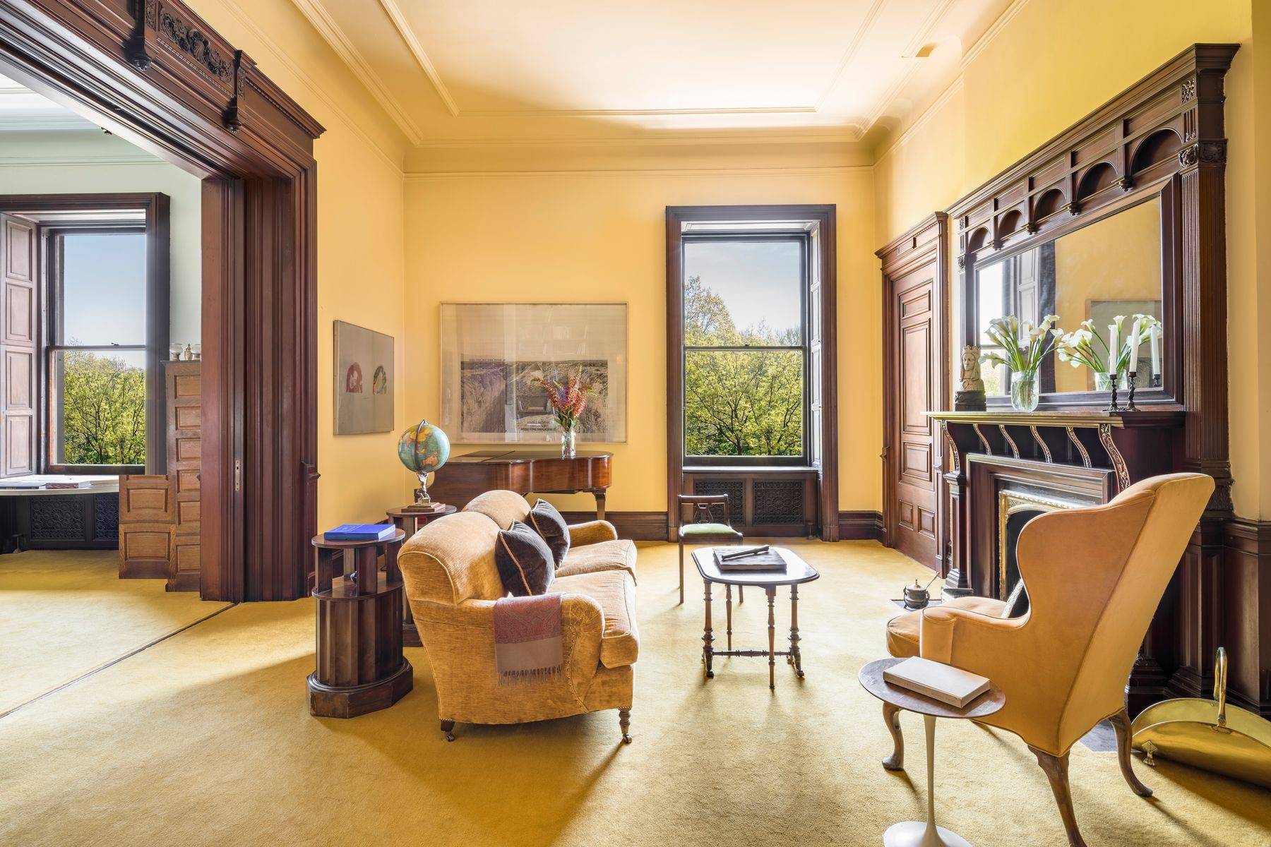 Distinguished by four principal rooms overlooking Central Park and the southern city skyline, this grandly scaled apartment features a total of 57 linear feet of direct park frontage.