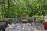 Spacious wood deck with perimeter railing