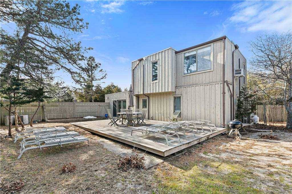 On a private dead end road in the Amagansett Dunes, nestled behind a wooden gate sits this four bedroom, two bath, home.