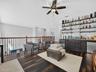 Loft with bamboo flooring and Upstairs wet bar