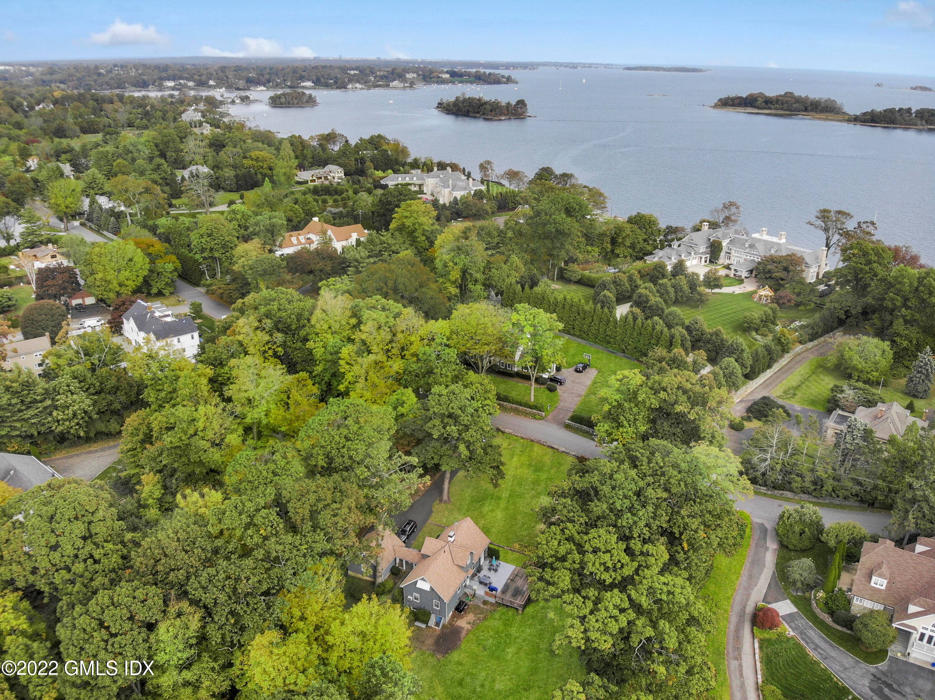 Waterfront home with possibilities to build a new home on prestigious Byram Shore Road.