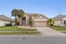Golf-front pool home at the Oaks National Golf Club.located on the 13th hole with a generous footprint and premium lot