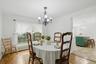 Lovely Formal Dining Room with double window overlooking back yard~