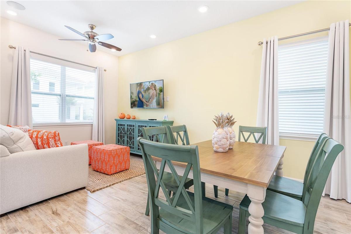 Open living and dining space perfect for entertaining in Kissimmee short term rental near Disney