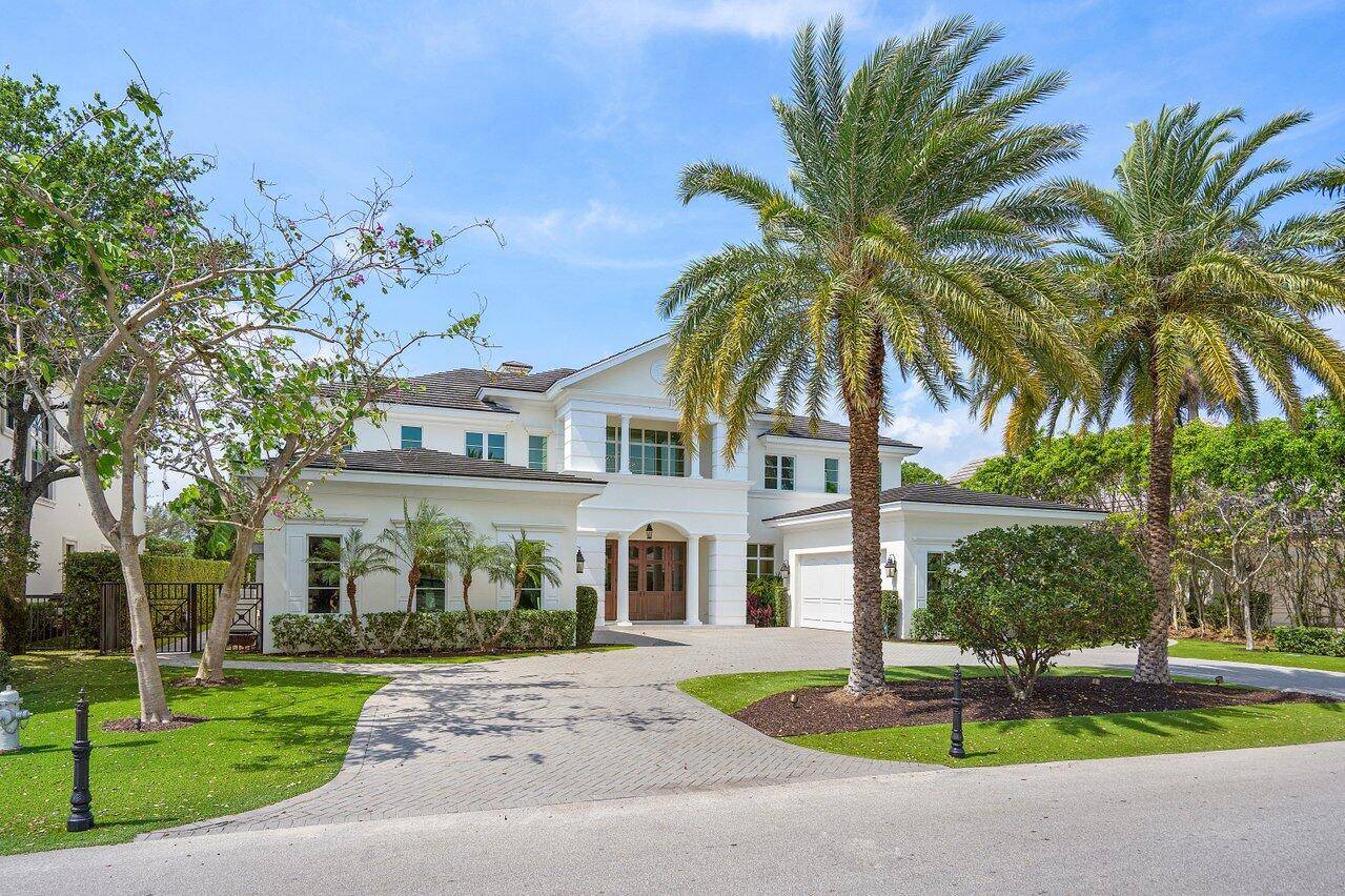 This exceptional Golf Course residence offers elegance and modern contemporary luxury Style in The Prestigious Royal Palm Yacht CC.