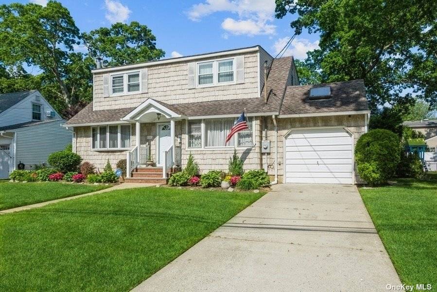 Welcome to 221 Victory Drive located on lovely quaint small block in Massapequa Park.