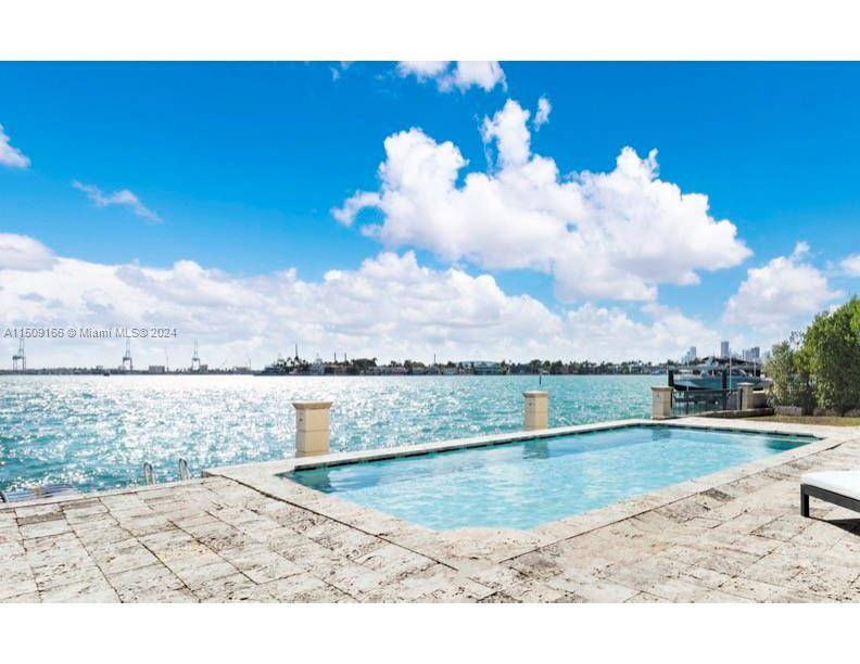 Exclusive waterfront opportunity to build your very own tropical oasis with unparalleled sunset views on the coveted Venetian Islands.