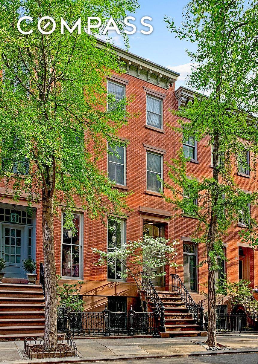 This charming townhouse on coveted Perry Street is rare to find at nearly 22 wide.