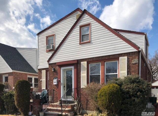 Legal 2 family brick home in Cambria Heights offers 2 kitchens, 3 br, 2 fbths amp ; full carpeted basement perfect for home office, storage closets ose and gar plus ...