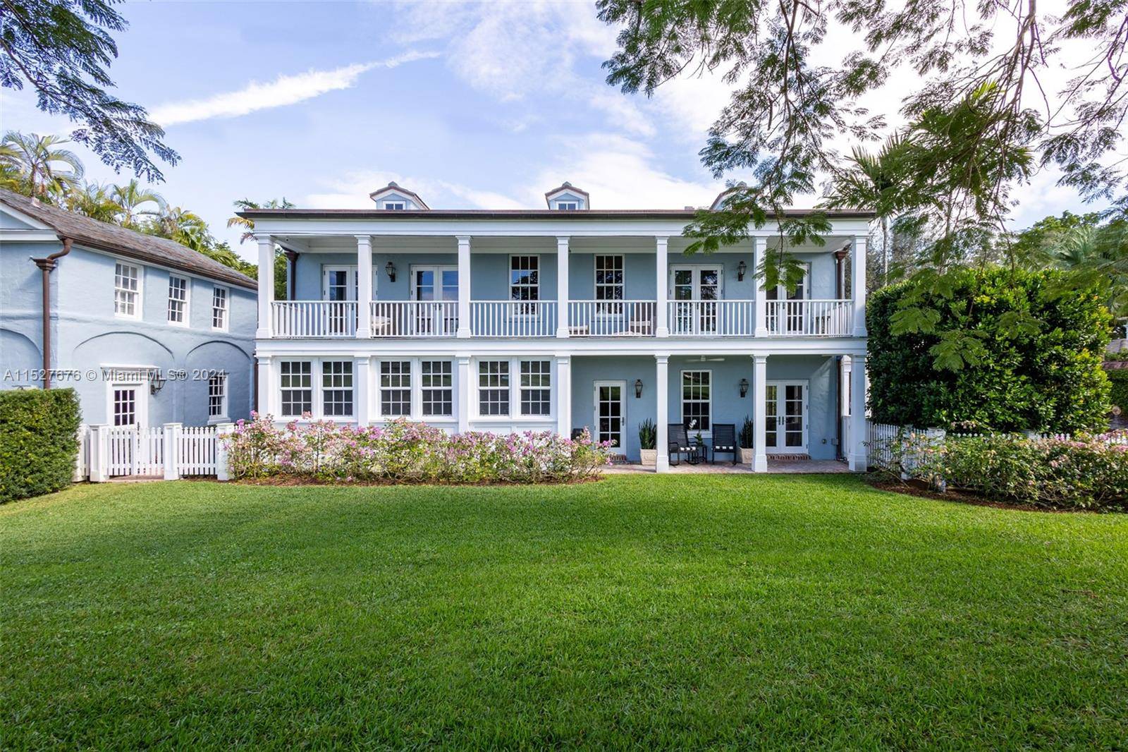 One of five original Coral Gables pioneer village homes, this impeccable 1938 8, 711 SF estate on picturesque Santa Maria Street overlooks the 15th hole of the Riviera Golf Course.