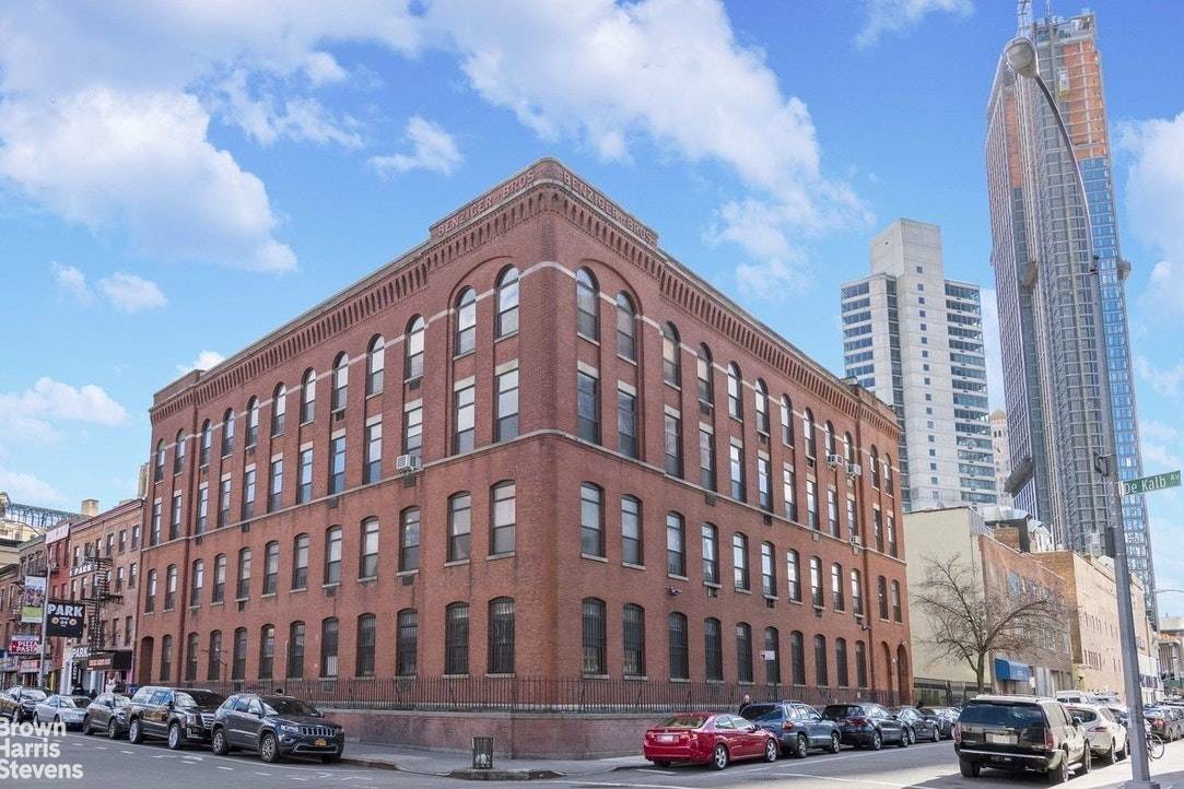 Rare opportunity to buy a huge two bedroom two bath loft with deeded parking spot in a coveted factory building in Fort Greene.