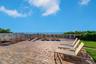Seaside deck with gazebo, covered outdoor kitchen & grill is adjacent to pool/spa.