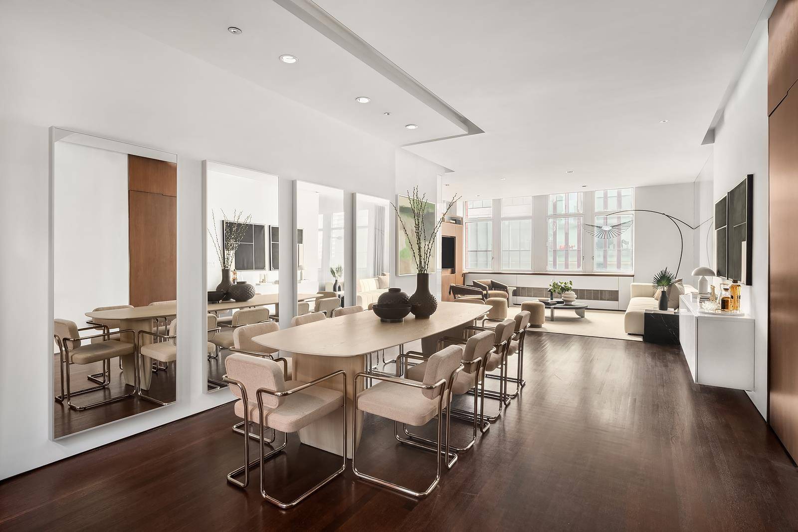 Welcome to residence 6A, a rarely available custom renovated split two bedroom in one of SoHo s premiere doorman condominiums on the edge of Greenwich Village.