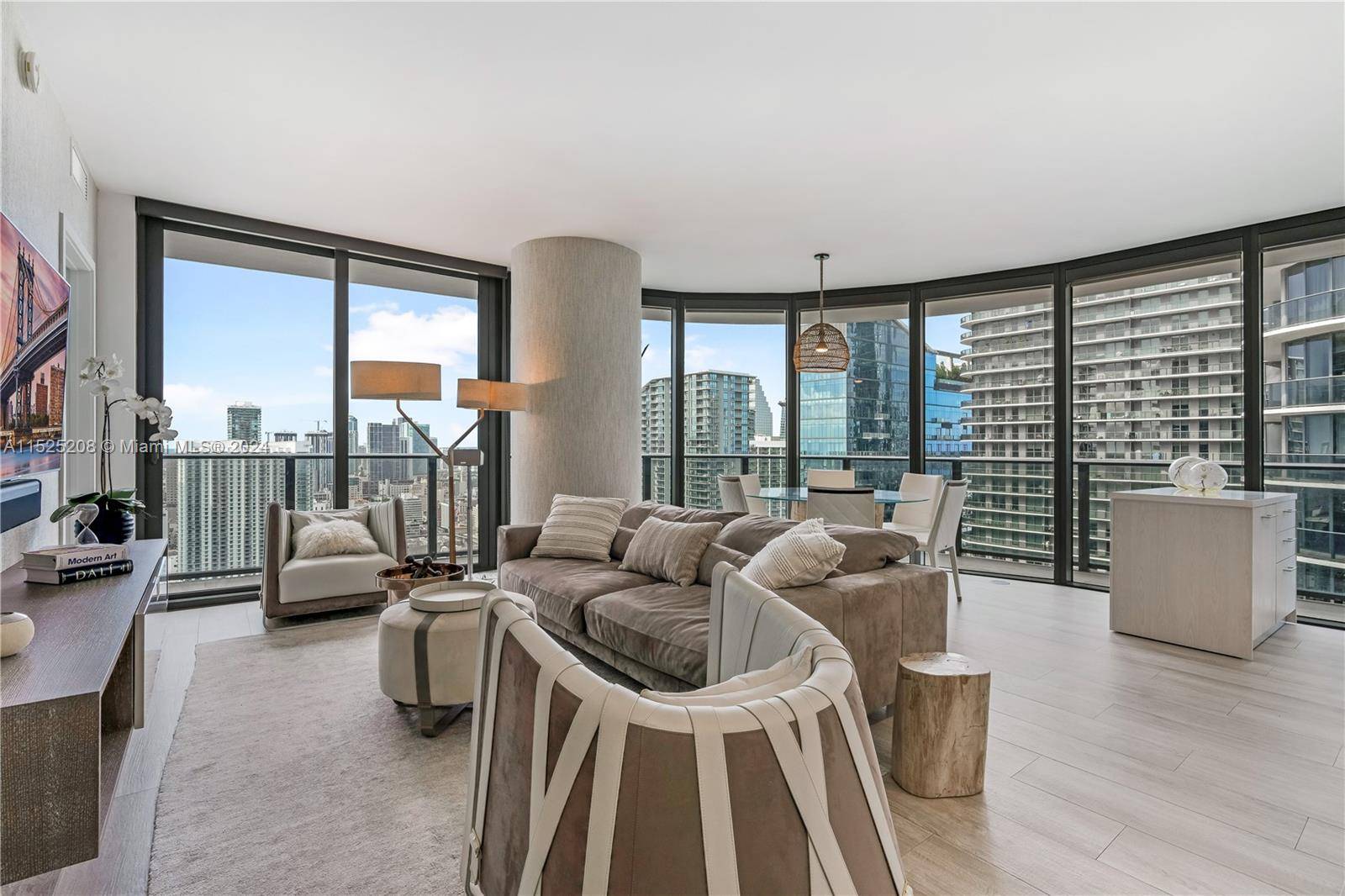 Enjoy both Bay and Miami skyline views from this custom designed, turnkey corner unit offering 3 en suite bedrooms and 3.