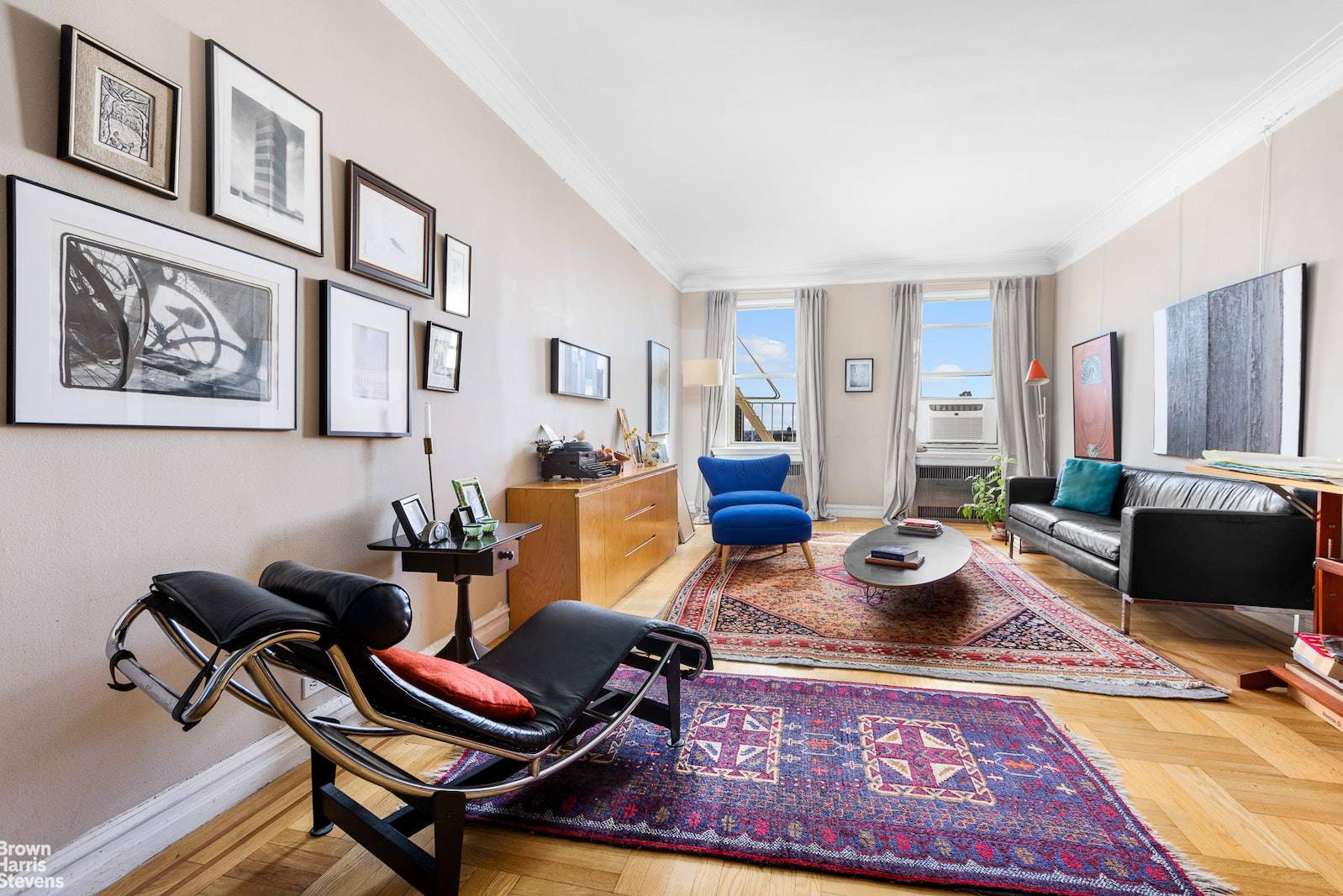 Art Deco details abound in this super quiet TOP FLOOR large two bedroom two bath apartment with high ceilings, graceful arches, and tons of prewar charm.