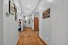Private Hallway Leading to the Primary & Secondary Ensuite Bedrooms
