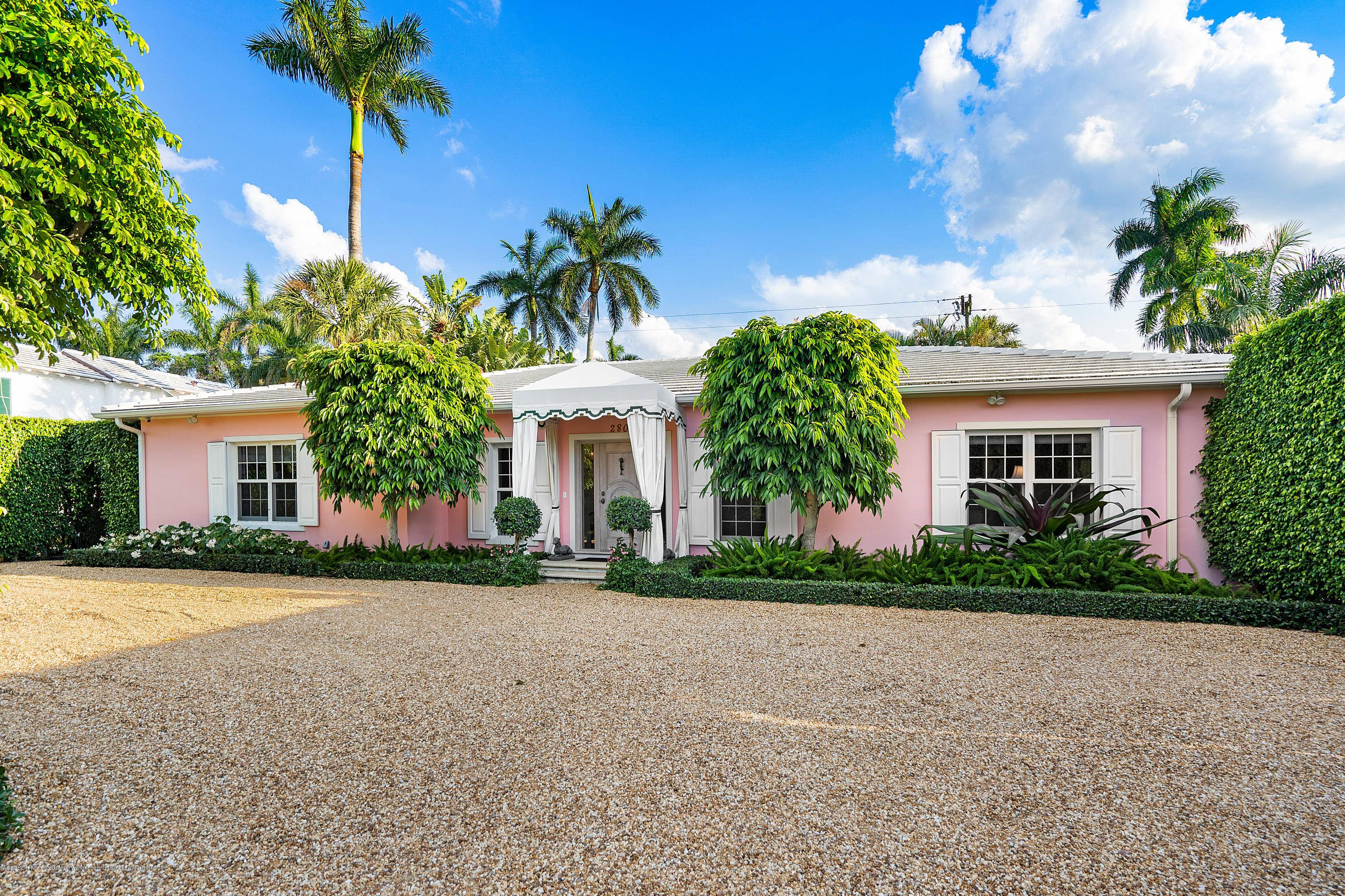 Classic Palm Beach style, 4 BD 4 BA, Bermuda home close to town on desirable street.