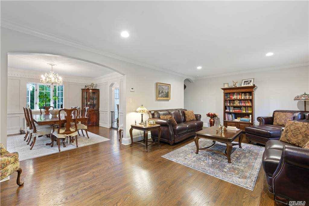 Beautifully landscaped property that surrounds a tastefully updated Colonial.