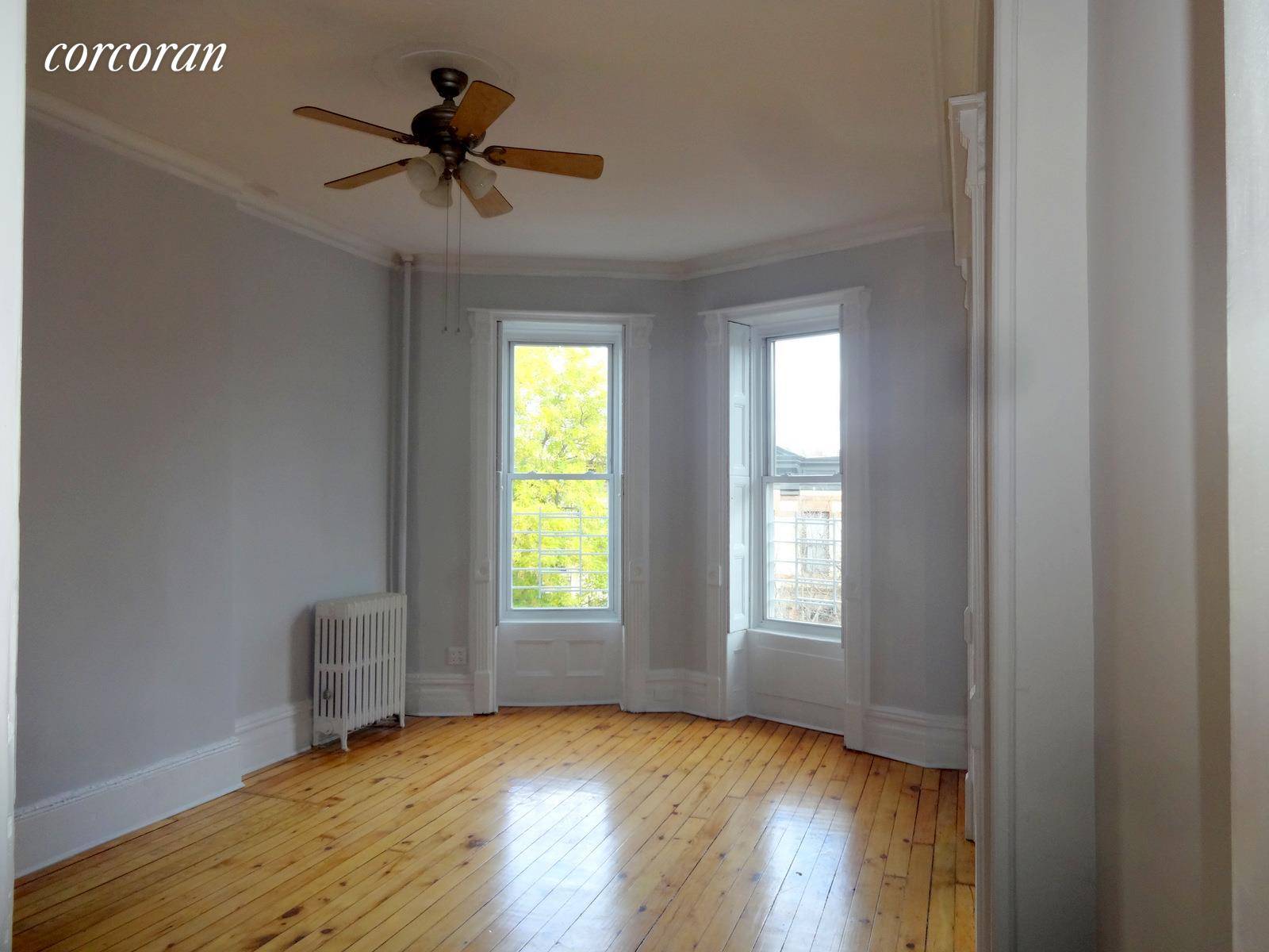 Fully renovated 3 bedroom home in a beautiful brownstone on a tree lined street !