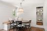 Beautiful shiplap feature wall with built in shelving.