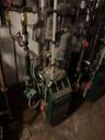 Utility room featuring a heating unit