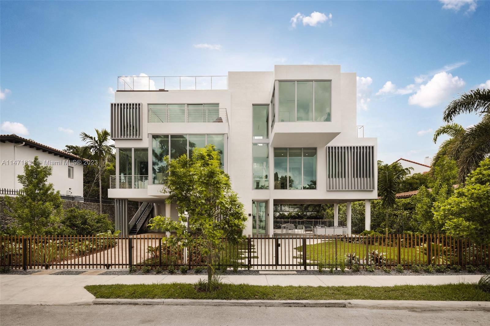 This exquisite brand new construction Coconut Grove home embodies modern elegance.