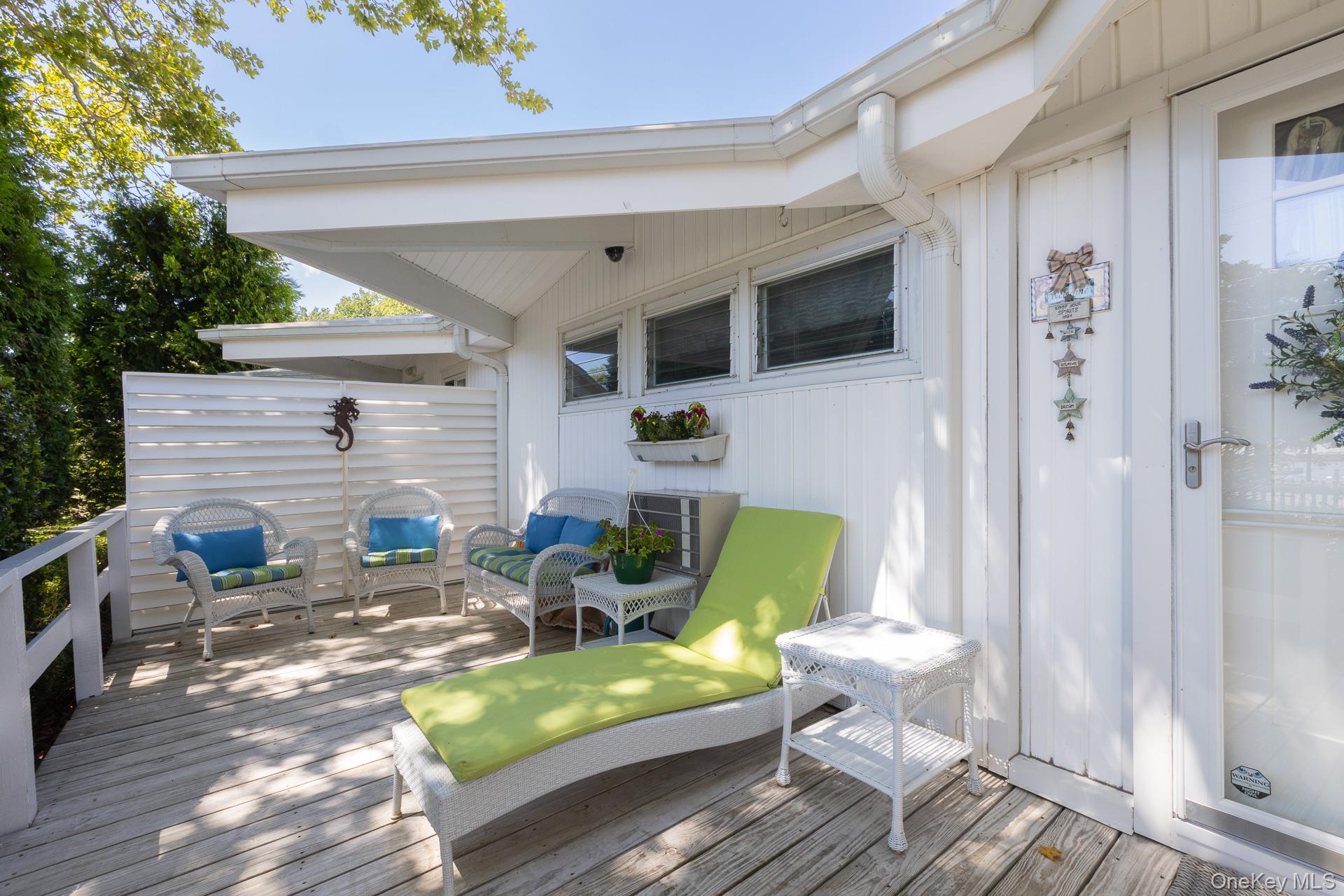 Front Deck featuring an extended overhead roof