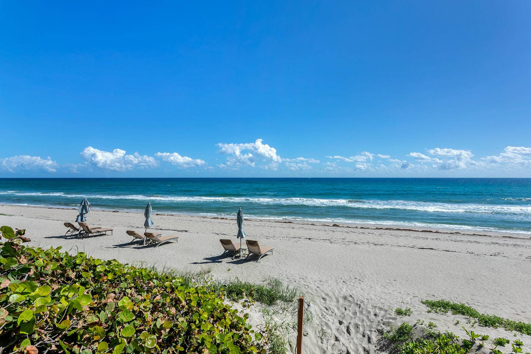 Classically remodeled, in soothing neutral tones is this stunning ocean view and South facing Palm Beach condo.