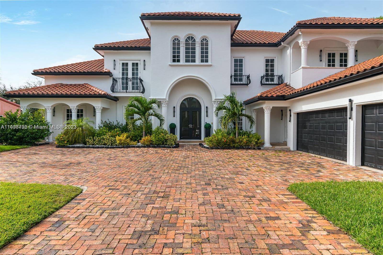 REDUCE MAGNIFICIENT WATERFRONT GATED ESTATE ON 1 3 OF AN ACRE LOT IN PRESTIGIOUS EAST CORAL RIDGE IN SOUGHT AFTER BAYVIEW SCHOOL DISTRICT.