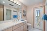JACK AND JILL shared full bathroom (by the two bedrooms), WALK out to the pool/beach