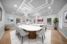 Dining space with light wood-style floors, recessed lighting, and crown molding