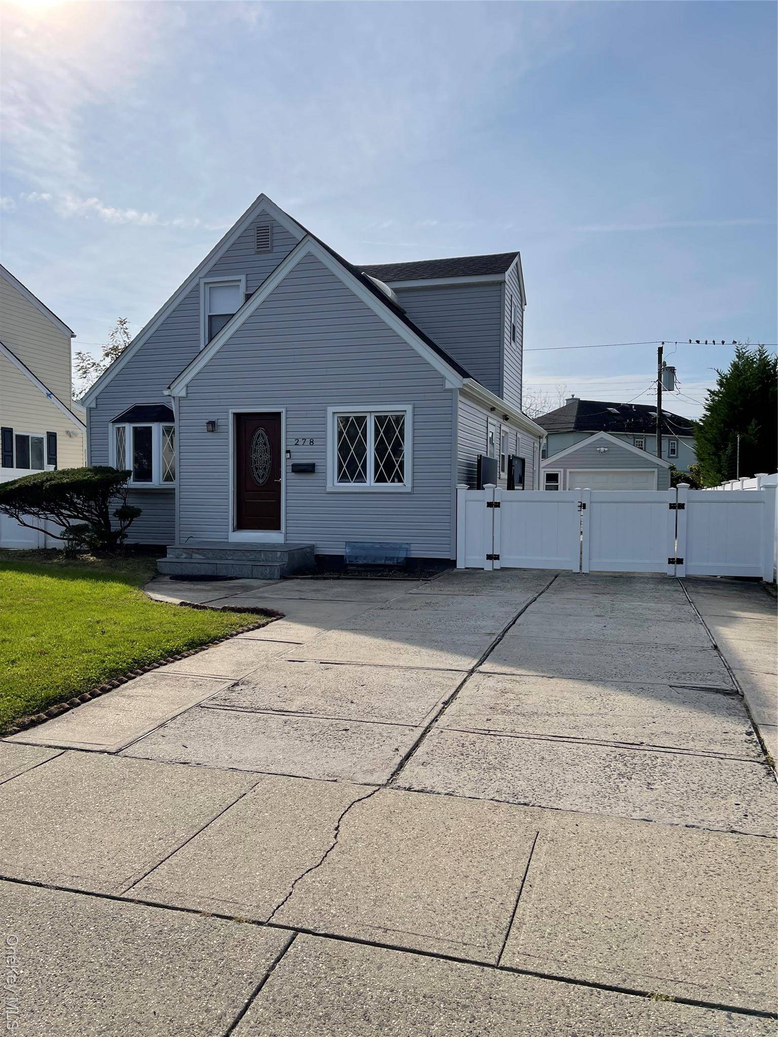 4 Bedrooms, 2 Full Bathrooms, Living Dining Room.