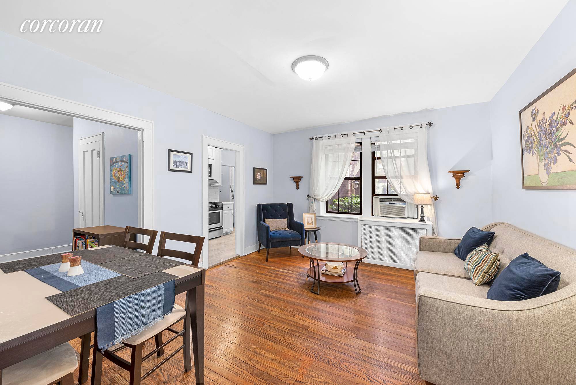 Welcome home to this garden level prewar 3 bedroom home with a deeded parking garage !