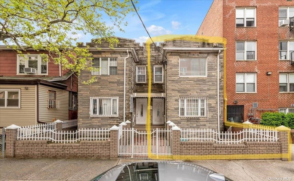 Legal Two family, the property is located on a busy commercial Street, half a block to 7 train station.