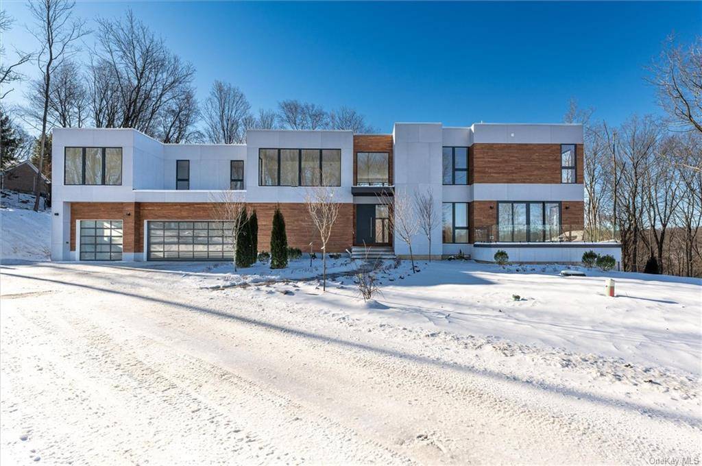 Step into the realm of contemporary luxury with this unparalleled new construction in the prestigious Old Iron Estates.