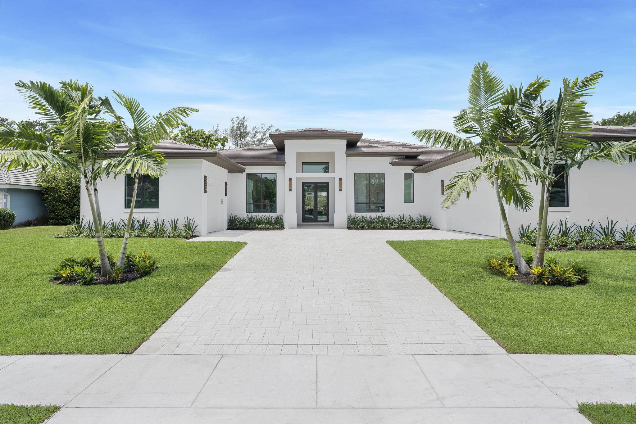 This new construction modern ranch home by Sam Fisch Development features 6, 000 square feet of luxury living on a nearly 1 2 acre lot in the Lands of the ...