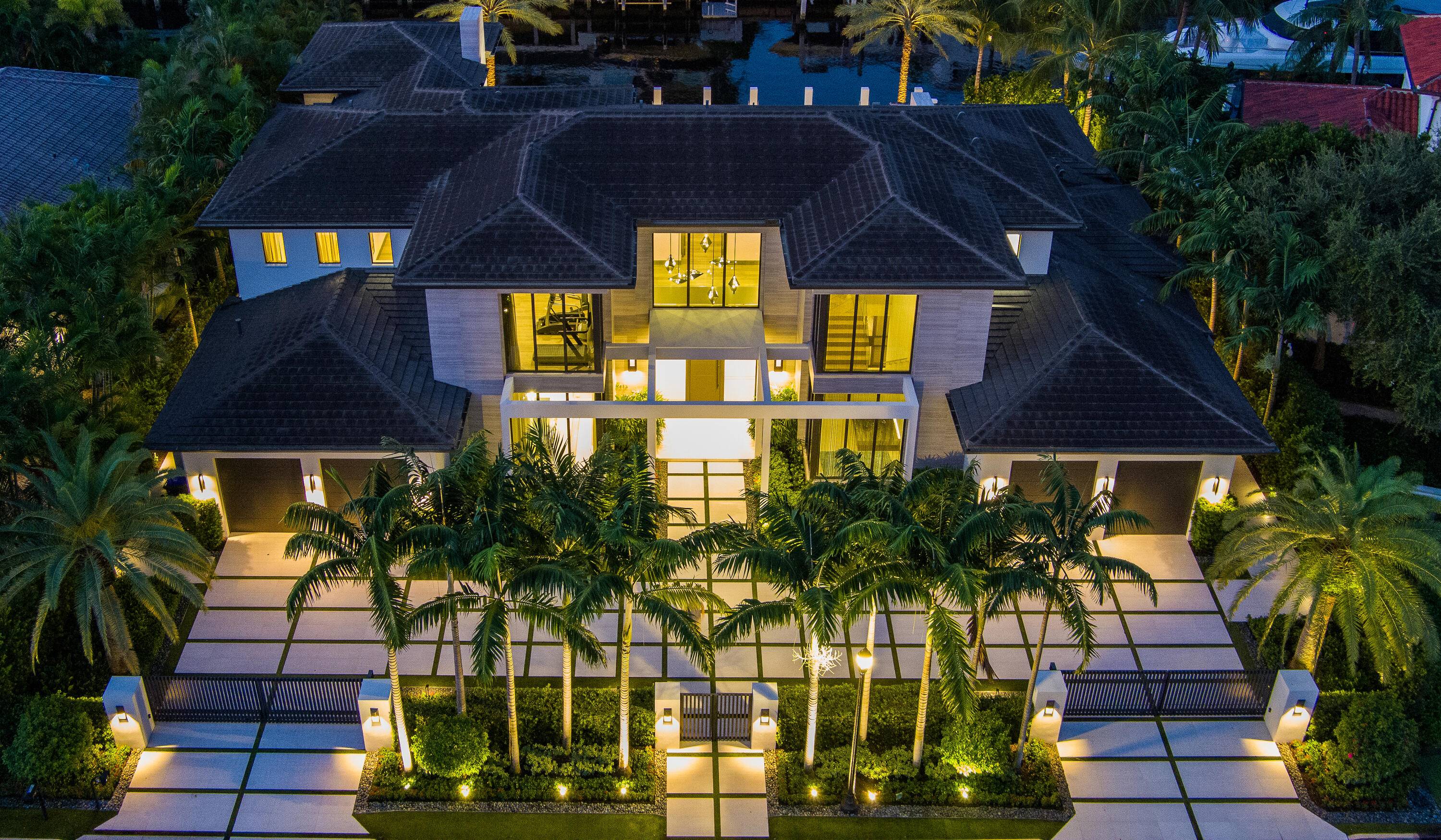 Gated Transitional designed Royal Palm deepwater estate sited on the Buccaneer Palm Waterway with 130 ft of waterfrontage, one off the point and furnished by award winning Marc Michaels interior ...
