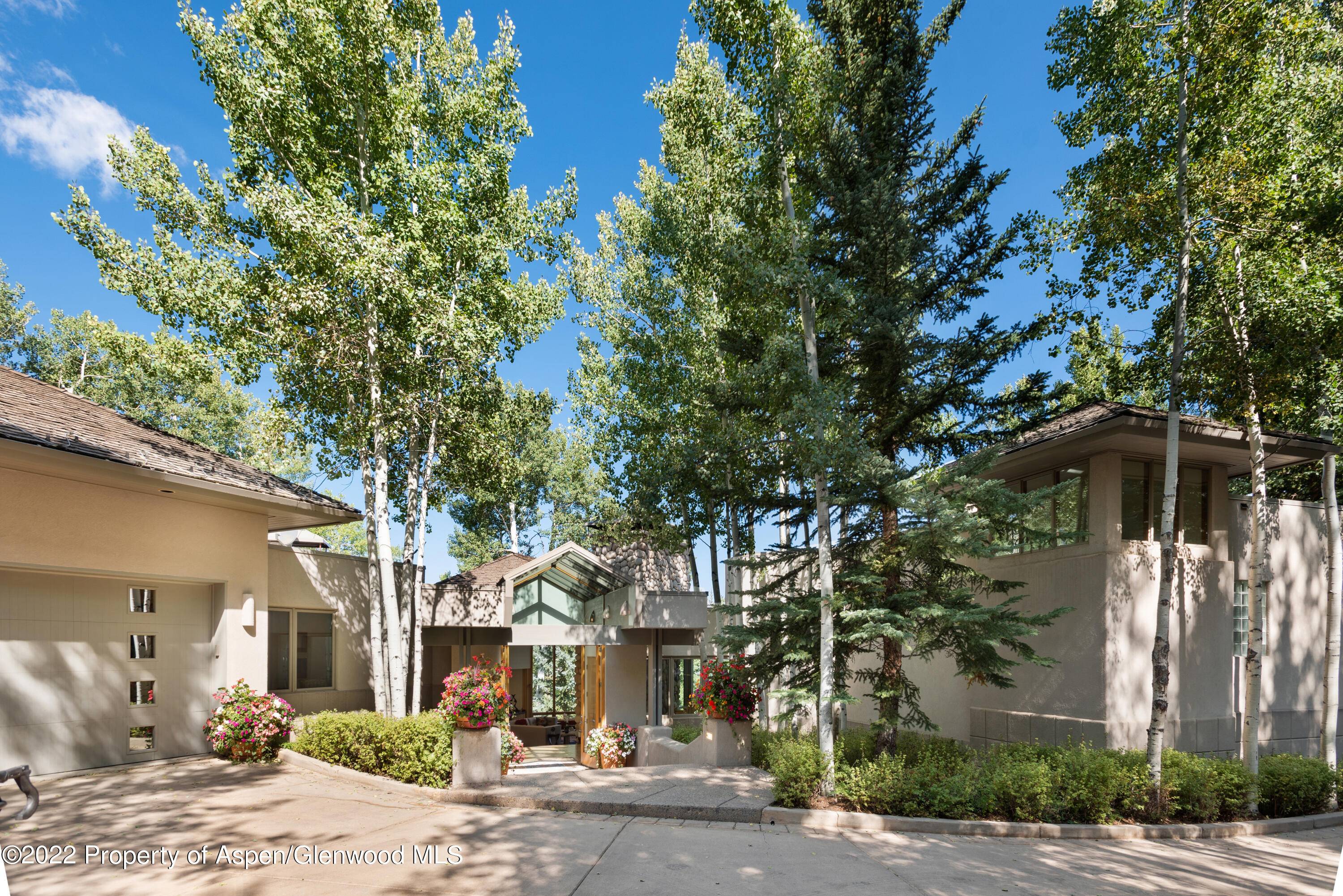 Contemporary styled home with superb views, privacy and ski in ski out located in Two Creeks subdivision in Snowmass Village.