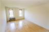 Unfurnished room with radiator and light wood finished floors