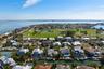 Two doors down from the community pool and tennis courts and two blocks to Key Royale Golf Club
