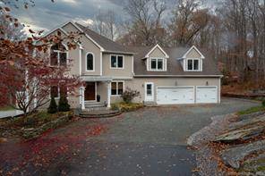 Beautiful home privately set just outside of Chester Village.