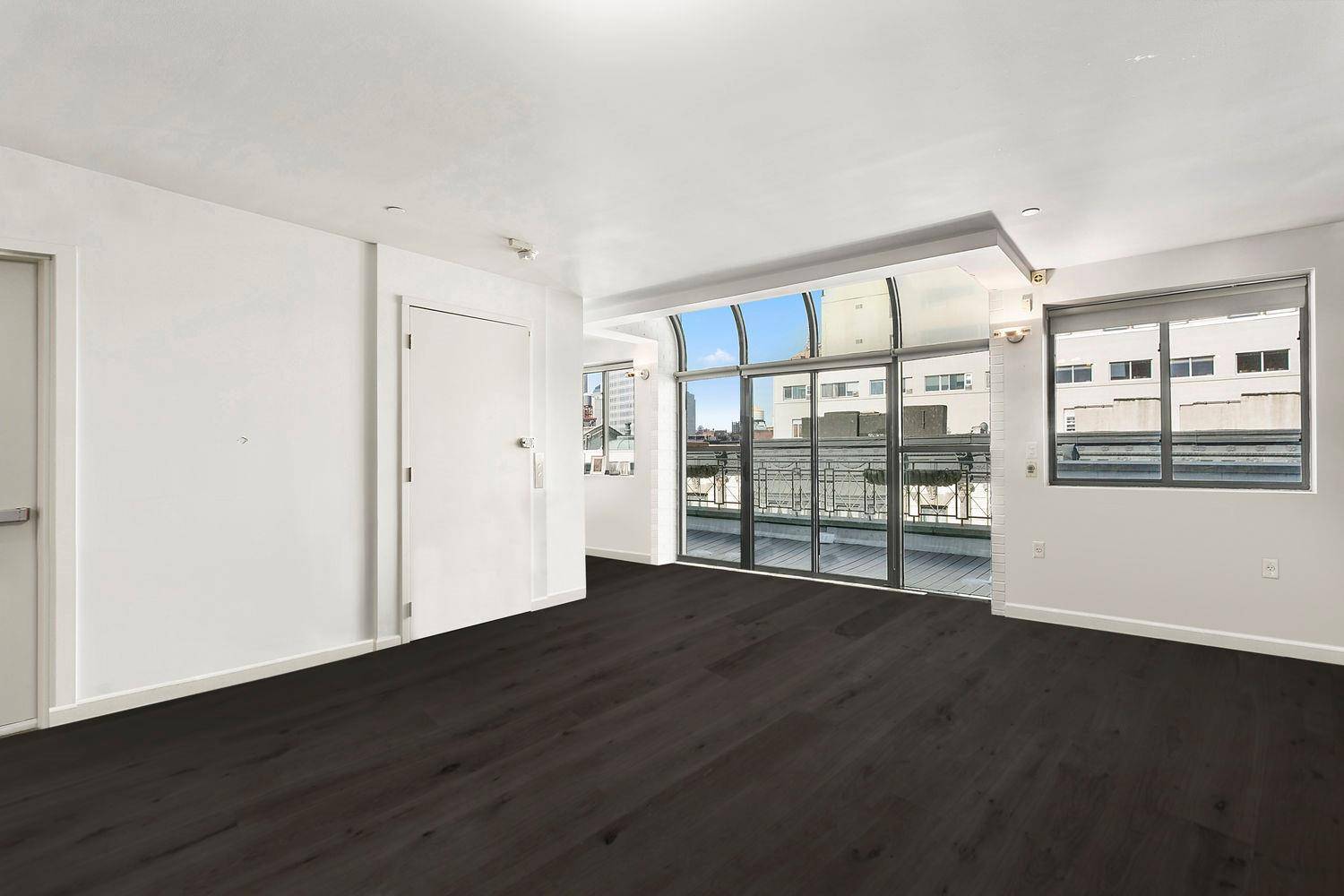 Stunning Penthouse Soho Loft with a large terrace off the living room and a private roof deck.