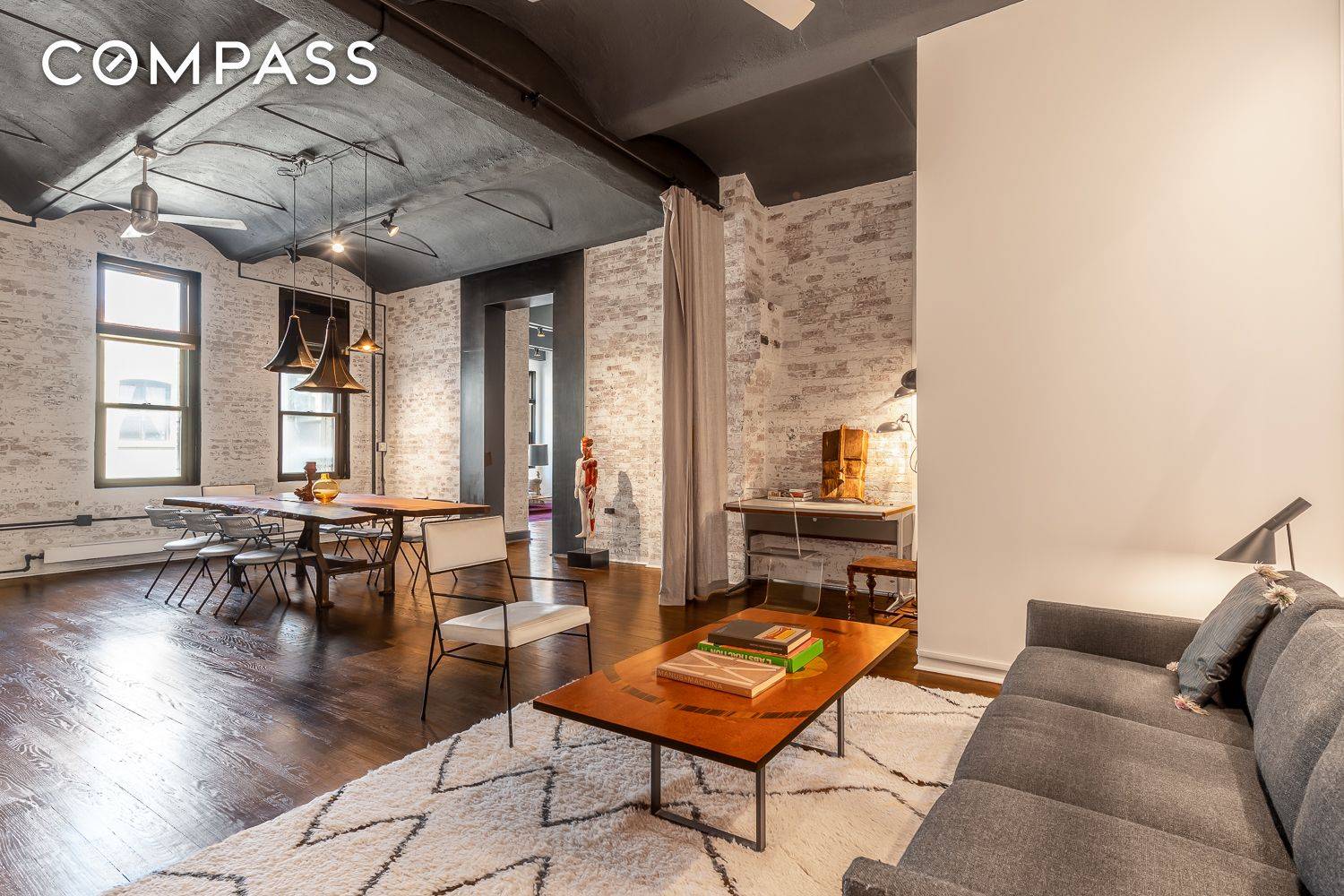 Enjoy urban living in this wonderful loft home accentuating authentic pre war and industrial details with smart modern design and custom finishes.