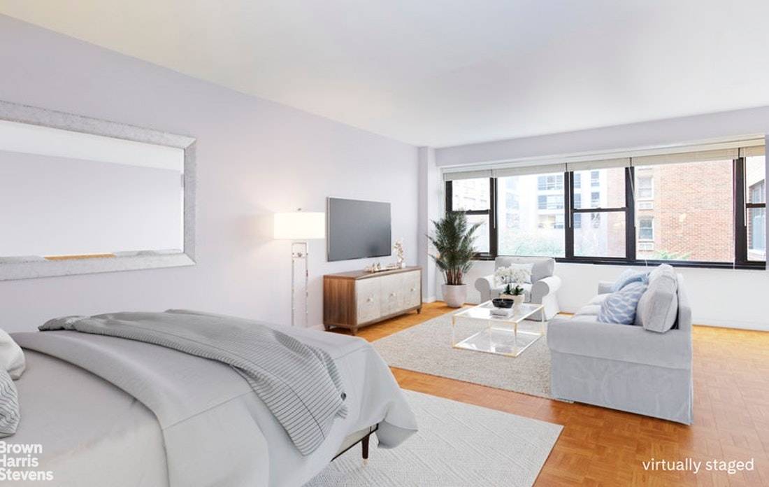 This bright, sunny, and spacious studio is pin drop quiet and located in a premier Sutton Place cooperative.
